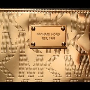 Gold colored Michael Kors Clutch/Wristlet